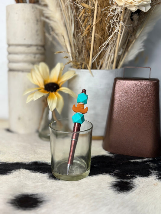 Cowboy hat with teal on brown